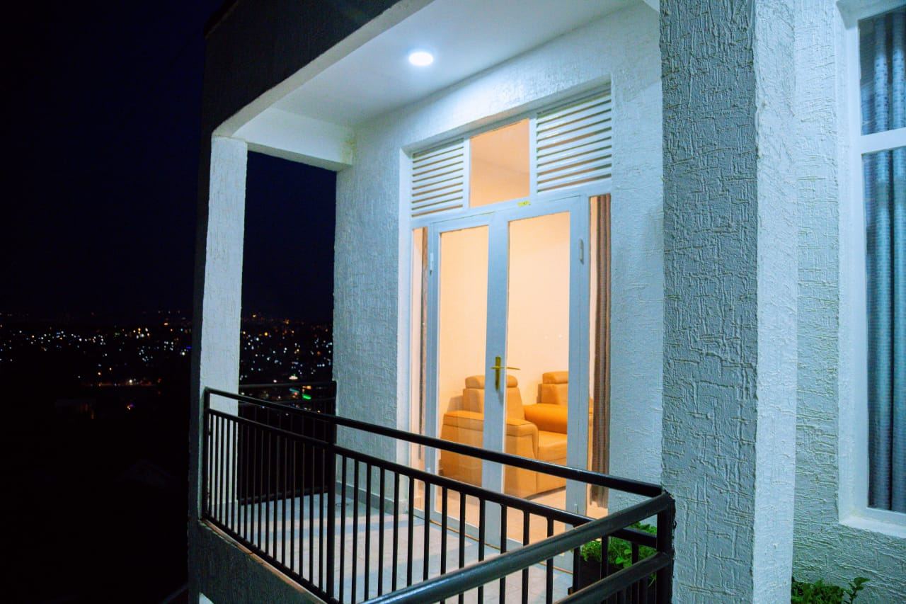 Balcony at night with living room view