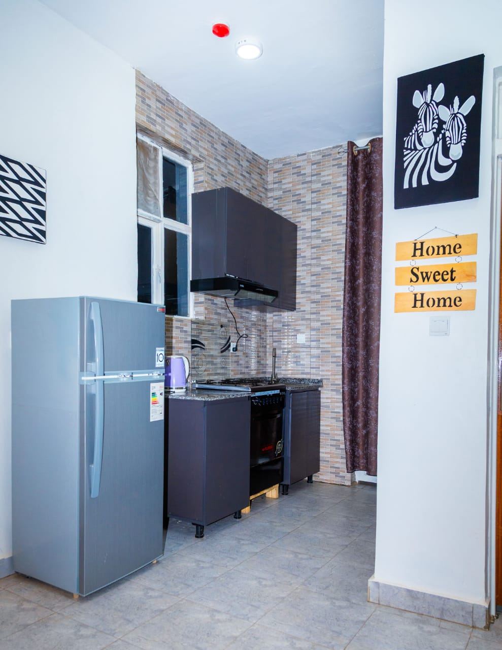 Kitchen with cabinets and appliances