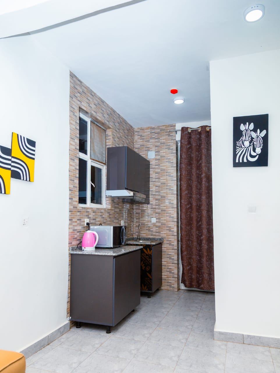 Kitchen counter with microwave and kettle